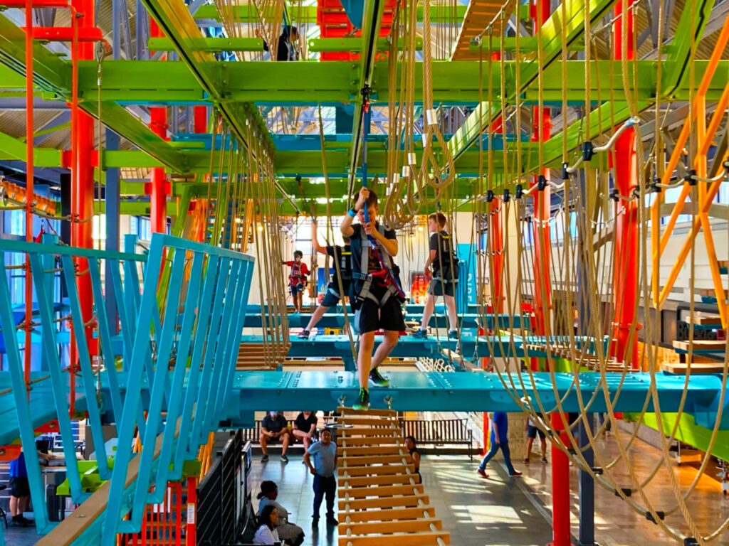 children doing a rope course